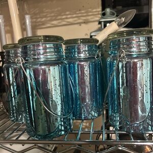 blue glass jar handle candle jars! 6 of them! Super cute and barely used!